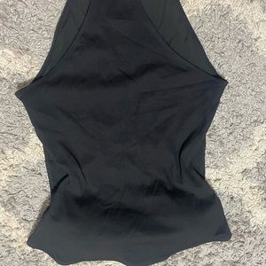 Black one piece high leg